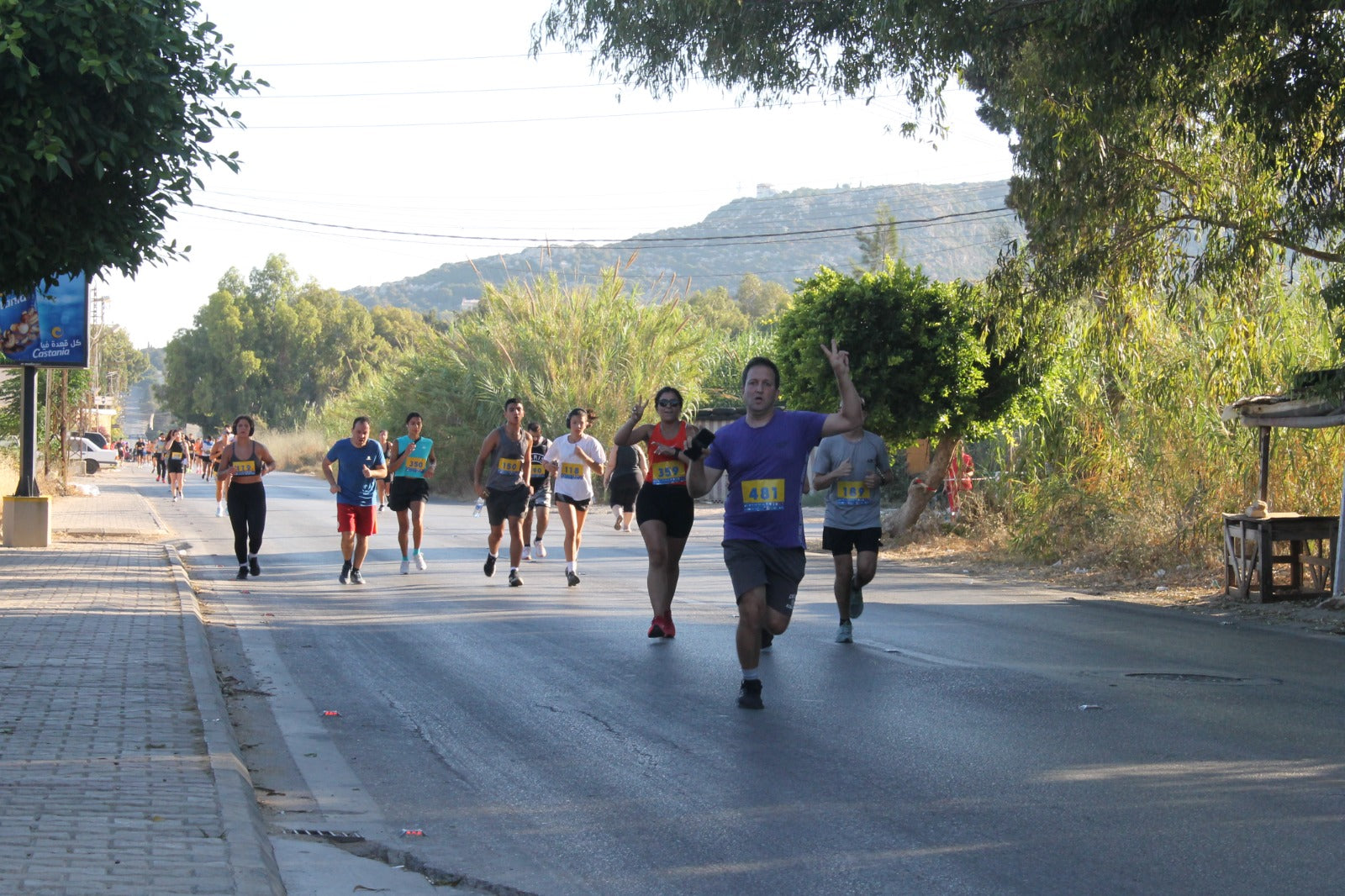 Race day crowd on the Batroun coastal route